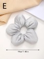 Detail view of 19cm large silver grey satin flower scrunchie with soft silk luster - Gray