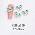 Detailed view of 3D alloy butterfly nail charms with light blue crystals and gold frame - Light Blue Butterfly with Gold Base (A759)
