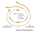Close-up of 18K gold stainless steel bracelet set with zircon stone and cross pendant - Champagne Rectangular Zircon Style (JDB2410027-11)