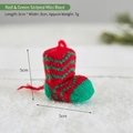 Mini red and green striped knitted Christmas boot ornament with size and weight details - Small Red and Green Striped Boot