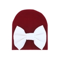 Infant beanie in burgundy knit cotton with a large white decorative bow on front - 0-6 Months / Wine Red and White