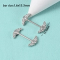 Detail showing 1.6mm gauge silver barbell piercing with five sparkling zircon stones - Triple Zirconia Ball