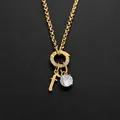 Collier en acier inoxydable plaqué or 14K avec une lettre f et un cristal rond clair - Lettre F