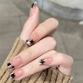 French pearly pink press-on nails with silver glitter tips and black star accents - Nude Pink French Silver Edge Black Star Style(JL0689)