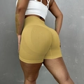 High-waisted seamless yoga shorts in ginger yellow with scrunch butt lifting design - S / Bottoms / Yellow