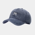 Close-up of a vintage navy blue washed cotton baseball cap with dog embroidery - Navy Blue
