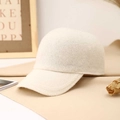 Minimalist cream knit wool blend baseball cap with a classic six-panel warm textured design - White