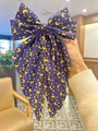 Nœud papillon violet foncé avec motif lunes et étoiles jaunes pour femmes - Violet