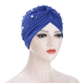 Detail of navy blue pleated turban featuring white pearls and silver metal beads - Sapphire Blue