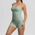 Detail of light green brushed fabric on the slim fit yoga vest and high waist shorts set - Basil Green