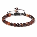Macro shot of 6mm natural stone beads with adjustable handmade braided black cord - 6mm / Coffee Stripes