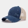 Detailed side view of distressed denim trucker hat with vintage mesh back and torn edges - Adjustable / Navy Blue