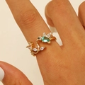 Elegant gold hummingbird ring with green pear-shaped zircon and white marquise crystals - Hummingbird With Green Rhinestone Style (4468)