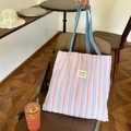 Pink, white and blue striped canvas tote bag with woven handles on wooden chair - Pink Stripe