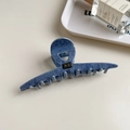 Blue denim texture acetate hair claw clip with black crystal detail on beige surface - Light Denim Bar Clip