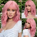 Pink medium bob wig with bangs showing multi-angle outdoor views for women - Pink