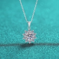 Macro shot of silver sunflower necklace pendant with sparkling white moissanite stones - 1 Carat White Moissanite
