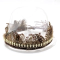 Close-up of transparent PVC fedora hat with brown feathers and gold skull chain detail - 08 Transparent Feather Hat