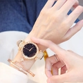 Close-up of rose gold tonneau watch with starry dial and matching star bracelet - Starry Sky Watch + Bracelet Set / Off White