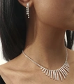 Silver waterdrop rhinestone jewelry set with tassel necklace and long earrings on a model - Rhinestone Fringe Necklace Earring Set (DTN14026772S)