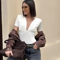White deep V-neck short sleeve bodysuit with pleated detail and padded shoulders for women - S / White