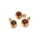 Close-up of three gold stainless steel charms with amber cubic zirconia stones - 10 Pieces per Pack / Gold Border Orange Brown Stone