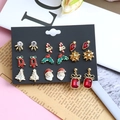 Christmas earring set with festive Santa, reindeer, and tree designs on black card - 9 Pairs/Set Reindeer Candy Cane Bowknot Christmas Earrings