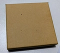 Top-down shot of a square brown kraft paper jewelry box on a clean white desk surface - Kraft Top and Bottom Box-9*9*1.6cm