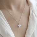 Rotating windmill pendant necklace in silver with sparkling pavé zircon stones - White Gold