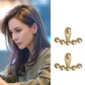 Minimalist golden pearl flower earring with 925 silver needle on female model - 925 Silver Needle / Rear Hanging Gold Beads