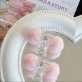 Cute pink plush ball hair claw clips with transparent base on a decorative mirror - Light Pink