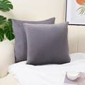 Grey velvet throw pillow cover with geometric chevron embossed pattern on a cozy sofa - Dark Gray