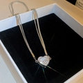 Triple-strand silver heart necklace with pavé crystal pendant on a black velvet display - Pave Heart Style (56#)