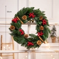 50cm Christmas wreath with red berries, pine cones and gold bells on white wood window - 50cm Pine Cone Bell Wreath