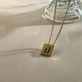 Elegant gold titanium steel square pendant necklace featuring 3D letter N design - Letter N