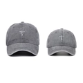Two vintage washed grey cotton baseball caps featuring faith cross embroidery on a white background - Gray
