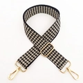 Detail of adjustable houndstooth bag strap with golden buckles and lobster clasps - Houndstooth Black