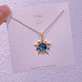 Dettaglio della collana con pendente a stella con cristalli colorati e centro galassia - Stella Strass Colorati (XK0035)