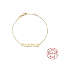 Bracciale minimalista in argento S925 placcato oro con ciondolo mama su sfondo bianco - Argento 925 / Oro