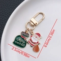 Christmas Santa Claus enamel keychain in gold finish with Merry Christmas gift bag charm - ER834-Enamel Santa Claus Gift Bag U-shaped Keychain