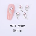 Dettaglio decorazione unghie zircone rosa a goccia, base argento, 6x9mm MZH-AM82 - Base Argento Strass Rosa (AM82)