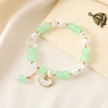 Beaded bracelet with light green round stones, white pearls, and golden Ruyi lock charm - Green Bead Bracelet + Small Lock (K3507)