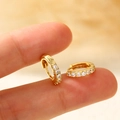 Minimalist gold hoop earrings with sparkling zircon stones in a classic hinged design - Mini Pave Zirconia Gold Huggie