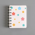 A7 pocket notebook with floral pattern and black spiral coil for student notes - Flower
