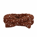 Detailed texture of brown plush headband featuring silver star prints and large bow - Coffee Headband