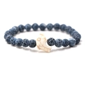 Elastic beaded bracelet featuring blue cracked agate beads and white dolphin charm - Weathered Stone