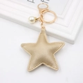 Champagne gold star keychain in PU leather with white pearl and gold lobster clasp - Gold Star