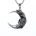 Macro shot of silver crescent moon pendant with rose relief and vintage steel texture - Steel Color Pendant (E0208)