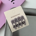 Set of four matte purple teardrop hair clips on cream card displayed on a metal tray - Khaki