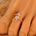 Adjustable golden seahorse toe ring with pink enamel detail for summer beach wear - Pink Seahorse (11922)